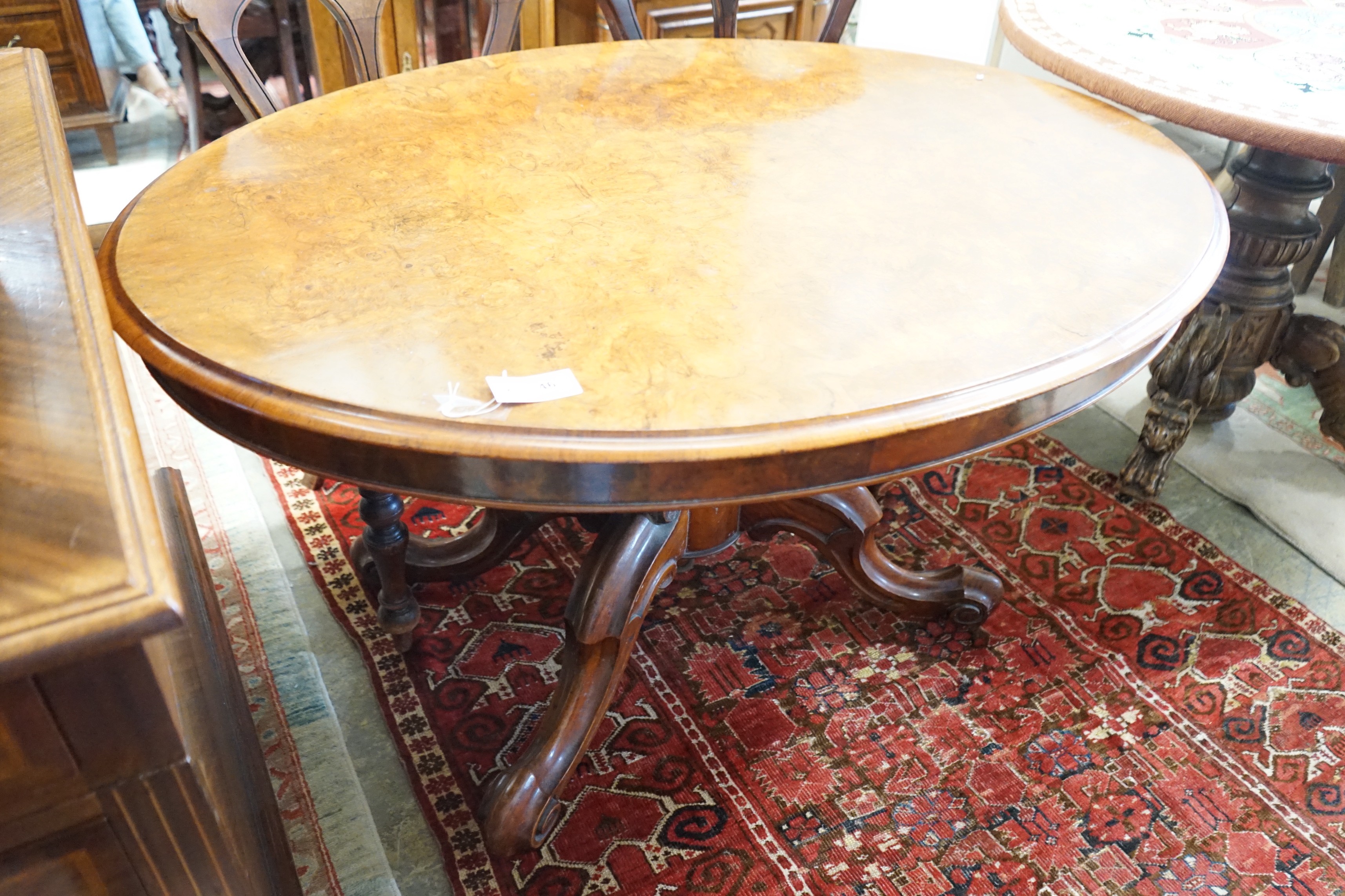 A Victorian burr walnut oval loo table, length 130cm, width 96cm, height 71cm